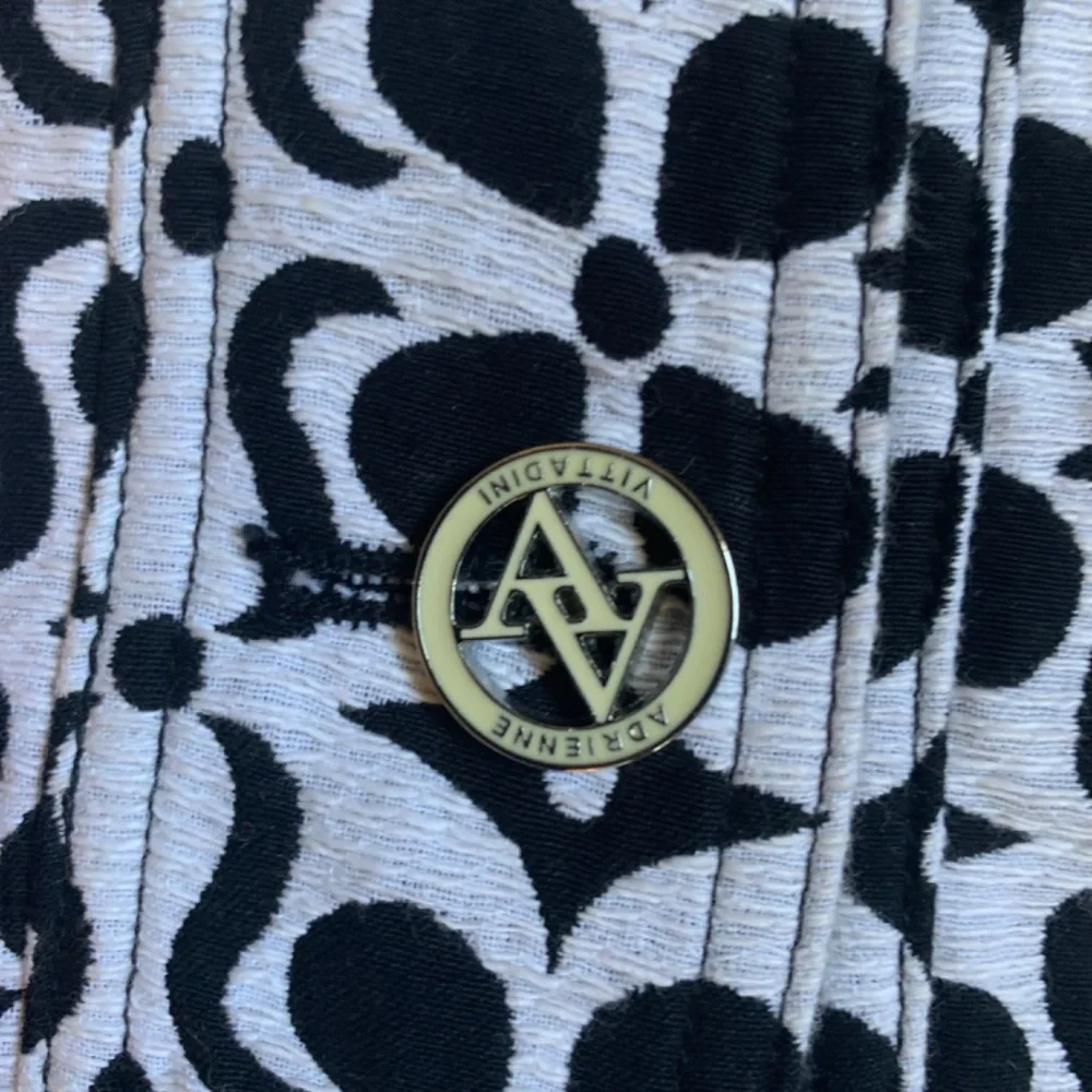 Adrienne vittadini 100 percent‎ cotton logo button skirt. Never worn. Retail 120